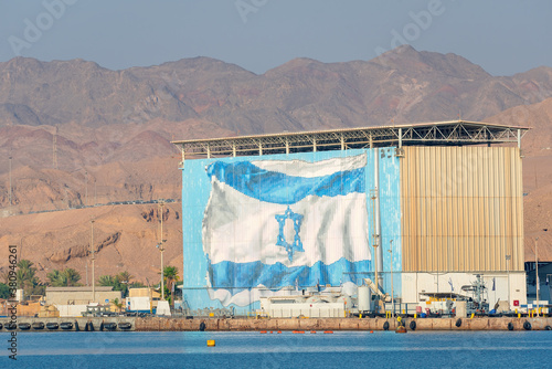 Eilat, Israel -  A very large israeli flag on a building in the bay of Eilat, Israel. 