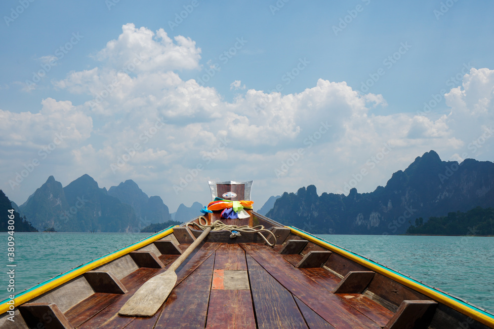 Thailand - on Cheow Lan Lake in a wooden boat with an oar