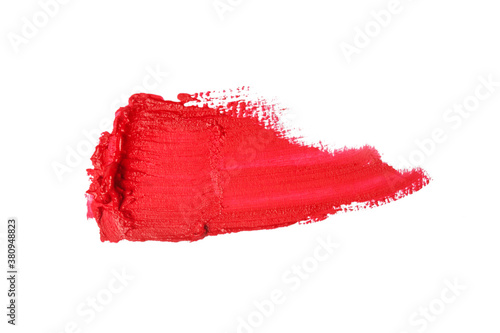 Smudged red lipstick isolated on white background