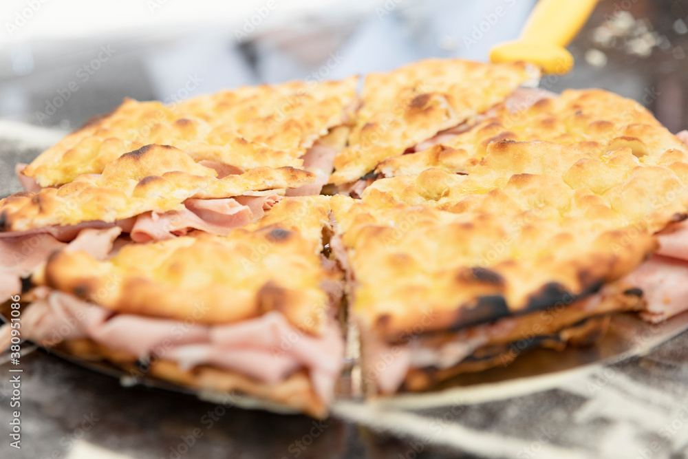 Italian cuisine: preparation of the white, with mozzarella and mortadella. Design serving. professional cook at work, use of hands. food photography for menus and websites Italian cuisine: preparation of the white, with mozzarella and mortadella. Design serving. professional cook at work, use of hands. food photography for menus and websites