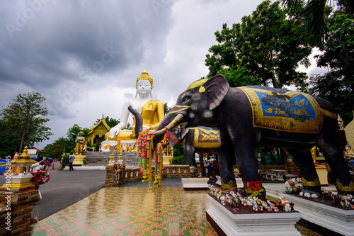 Buddhist monastery Wat Phra That Doi Kham in Chiang Mai. Temple Thailand.