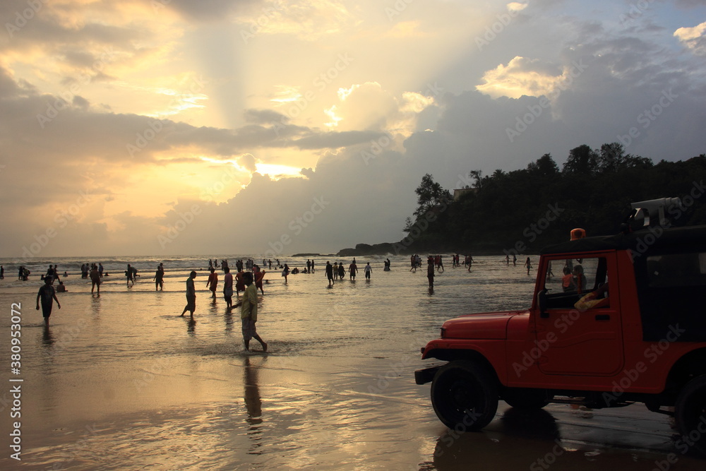 Sunset at Baga Beach, Goa, India - obrazy, fototapety, plakaty 