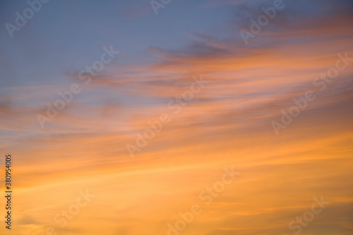 golden sky in the evening at sunset time for background  © Kenstocker