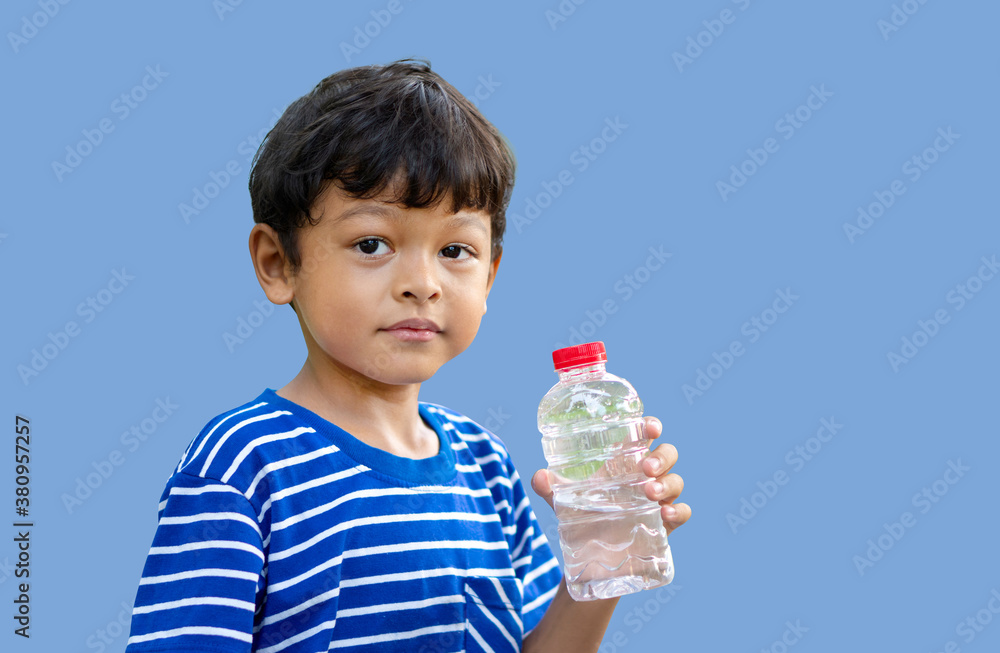 Kid thirsty water and hold transparent plastic water bottle water Kid thirsty water and hold transparent plastic water bottle water