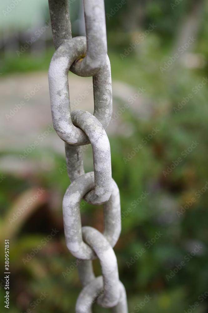 Chain hanging with nature background Chain hanging with nature background