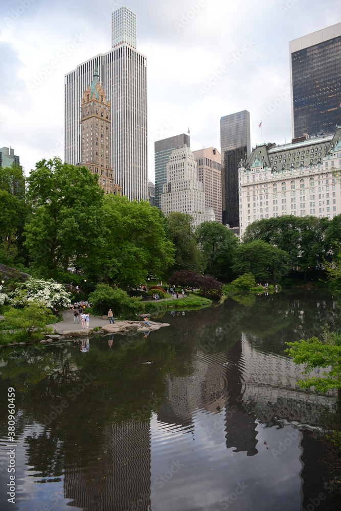 New York, NY, USA - June 5, 2019: People relaxing in Central Park located in Midtown Manhatten