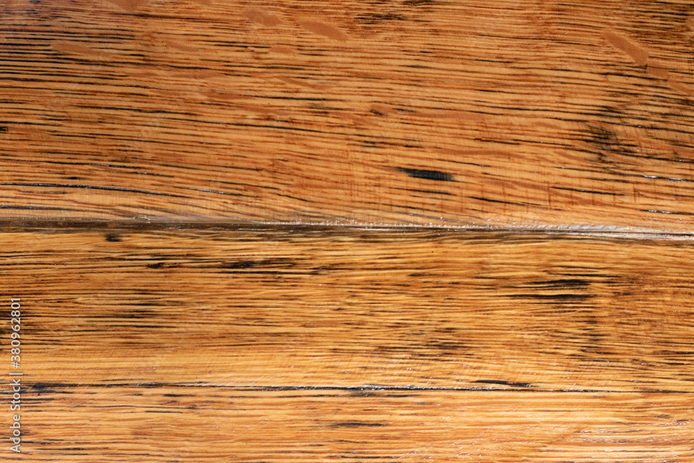 Fototapeta premium Old oak barrel fragment with dark and bright texture of wood