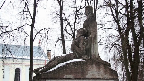 Sculptor Robertas Antinis Monument in Sirvintos, Lithuania. Mother holding her dying son - defender of Independence. photo