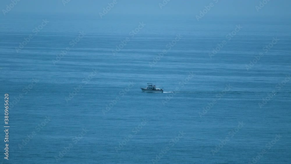 Boat floating at Palos Verdes, California during the summer day time. Boat floating at Palos Verdes, California during the summer day time.