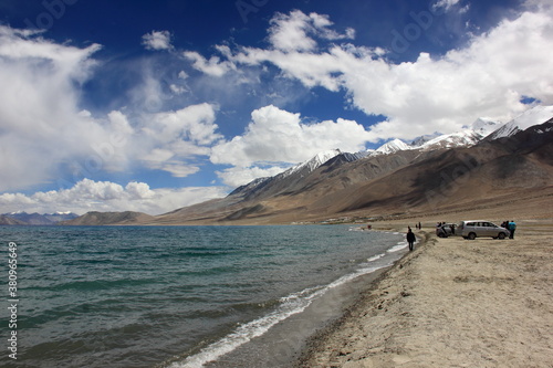 Pangong Tso, Pangong Lake, endorheic lake spanning eastern Ladakh and West Tibet, wetland with birds, mountain, blue sky and cloud around 