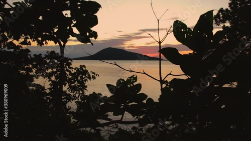 Sunset at the caribbean beach of Cayos Cochinos located in Honduras, Central America. photo