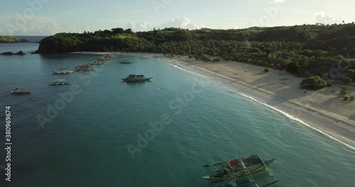 4K Aerial footage of Calaguas seashore flying towards beach photo