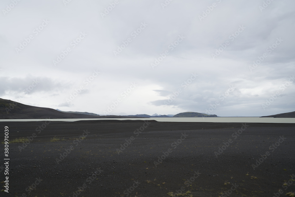 Vulcanic landscape in the highlands of iceland, black ash deserts with green moss