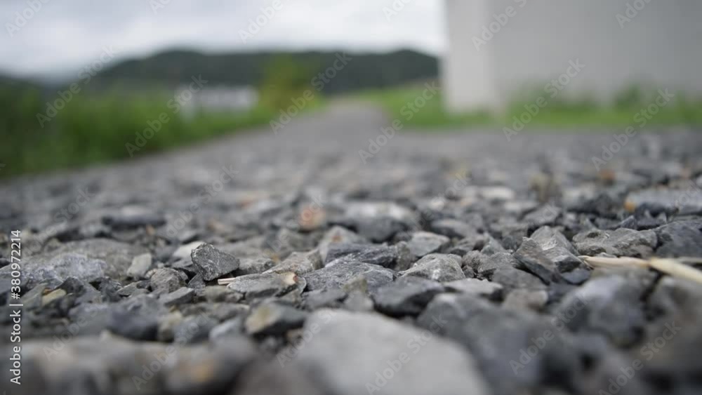 A dust comes up on a gravel road. A dust comes up on a gravel road.