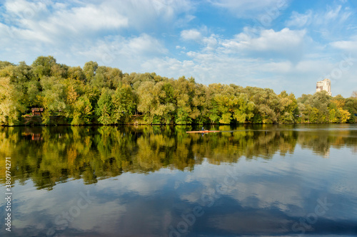 Obraz na płótnie Sportsman kayaking on the river. Autumn landscape. Moscow river in Strogino, Moscow w salonie