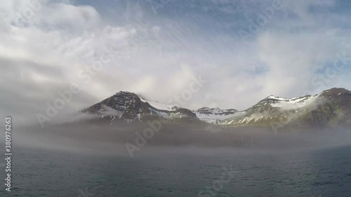 Wallpaper Mural Time Lapse of Clouds and Fog Rolling Over Mountains from a Ferry Arriving in Iceland Torontodigital.ca