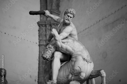 The marble sculptures of the fight of Hercules and the Centaur Nessus from Greek mythology in Florence, Tuscany, Italy. Stone muscular body statues of the demi-gods by Flemish sculptor Giambologna.