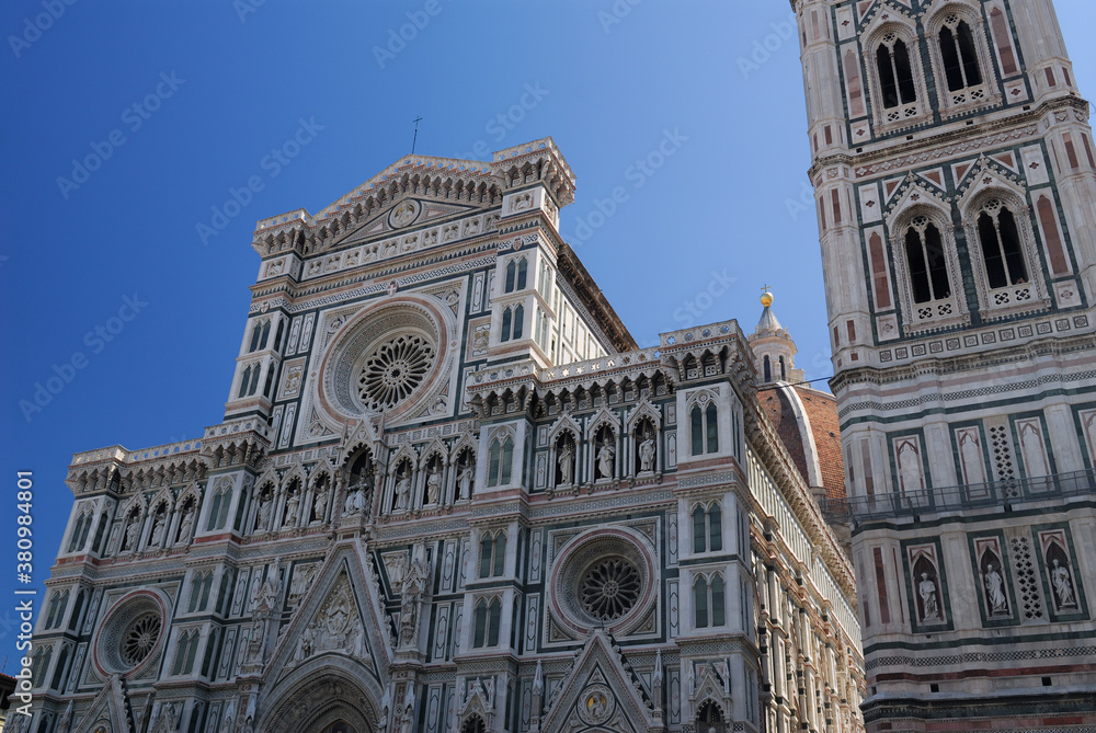Facade of the Duomo of Florence with the dome lantern and bell tower