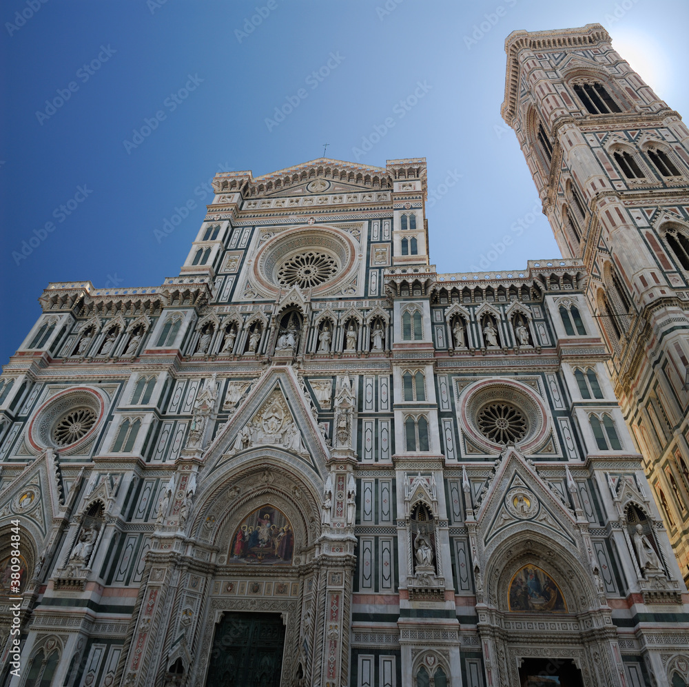 Facade of Florence Duomo Santa Maria del Fiori with bell tower of Giotto
