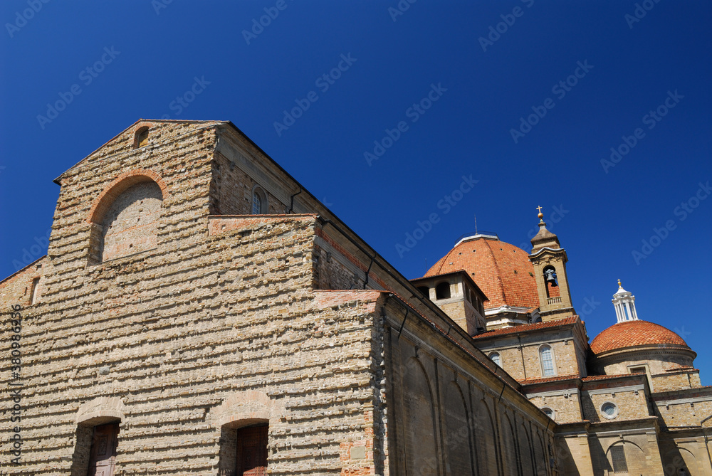Facade of Basilica of San Lorenzo with bell tower and dome in Florence Facade of Basilica of San Lorenzo with bell tower and dome in Florence