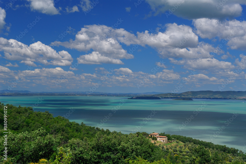 Maggiore and Minore Islands in turquoise waters of Lake Trasimeno Italy Maggiore and Minore Islands in turquoise waters of Lake Trasimeno Italy