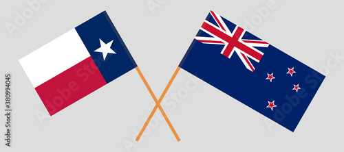 Crossed flags of the State of Texas and New Zealand