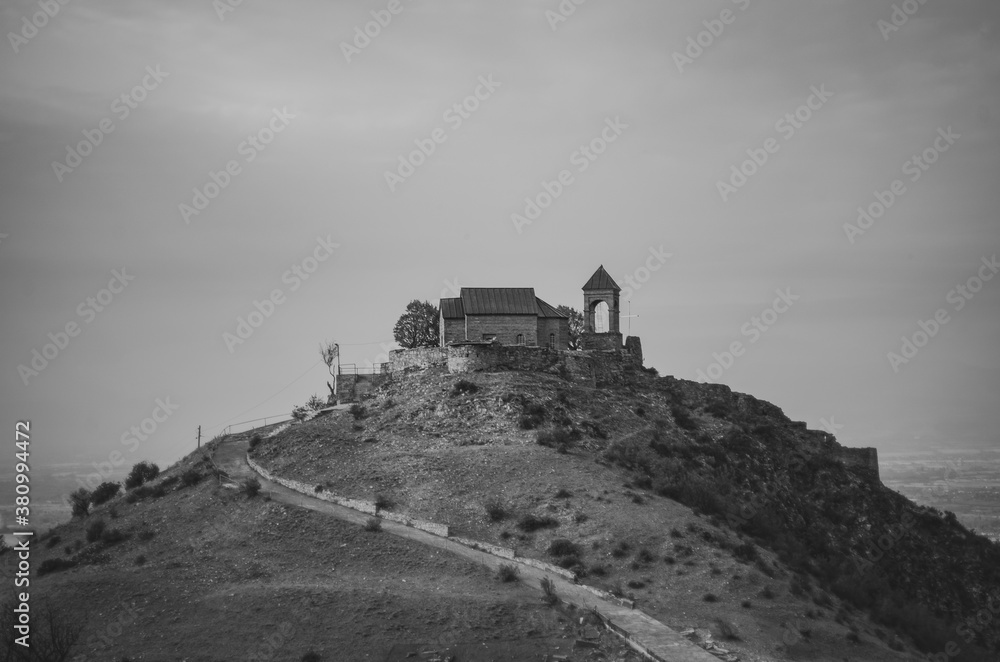 Obraz premium Castle/Church on top of the mountain