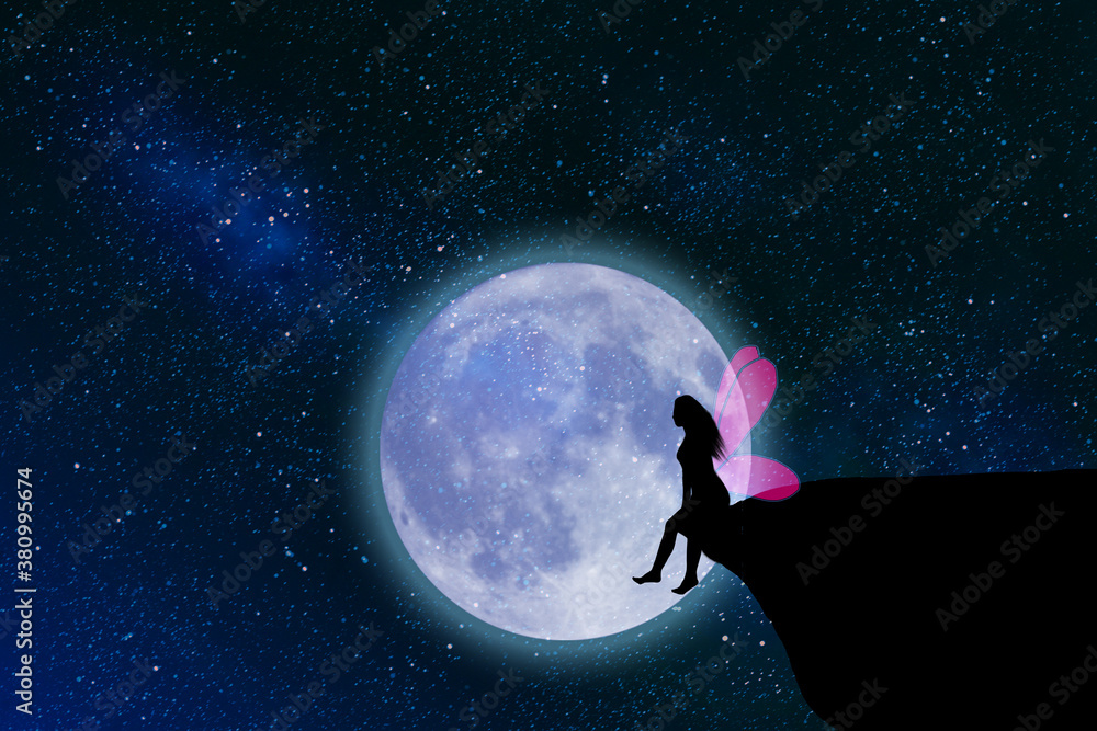 Silhouette of a woman sitting on a cliff. Silhouette of a woman sitting on a cliff.