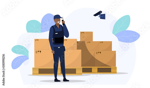 Security of the warehouse concept. The guard stands against the background of boxes stored on a pallet and speaks on the radio. Flat vector illustration