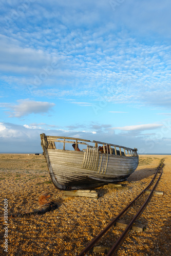 Wreckage of an old boat on the beach at Dungeness in Kent