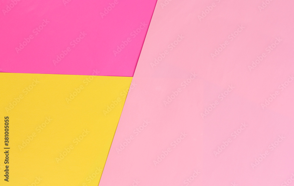 Colored background from paper of different colors. Pink, fuchsia and yellow. Office reminders.
