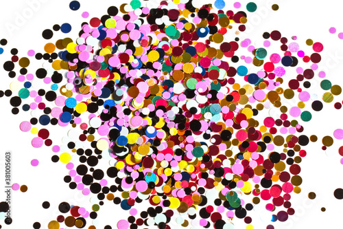 Many multicolored metallic circles forming a texture for the background.