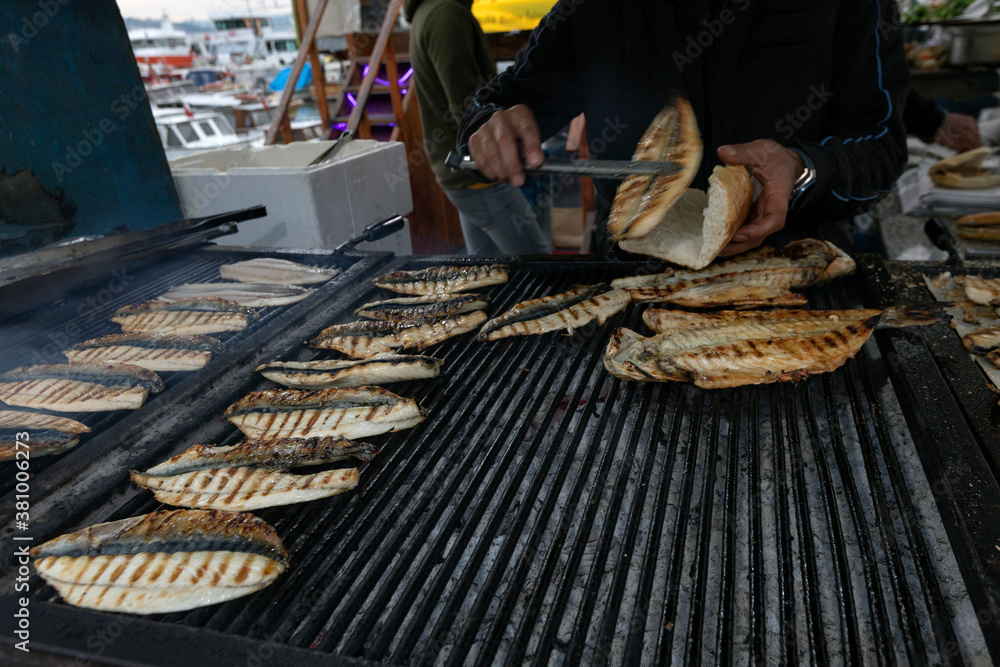 Fish and bread in the boat, Eminonu, Istanbul, Turkey. 