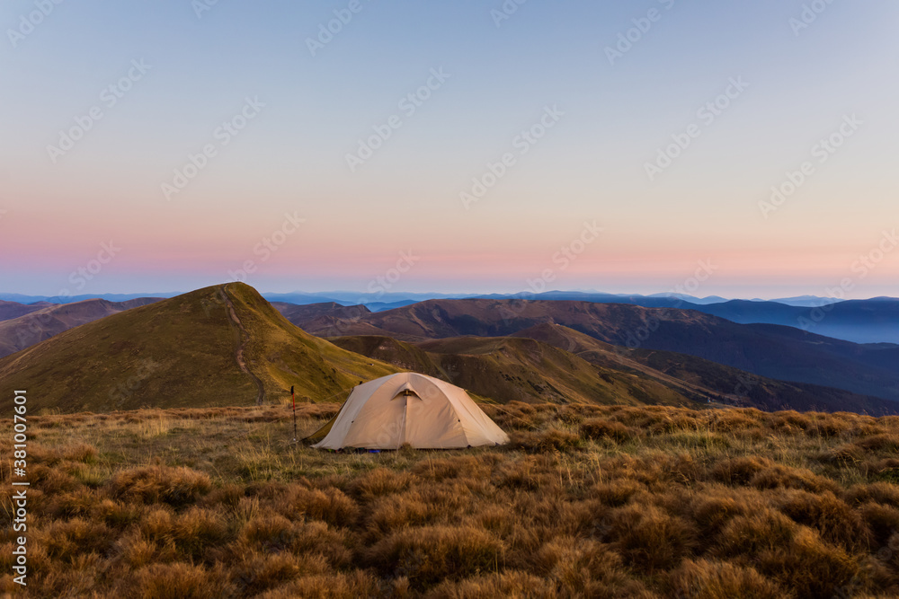 Tent early morning in Carpathian mountains