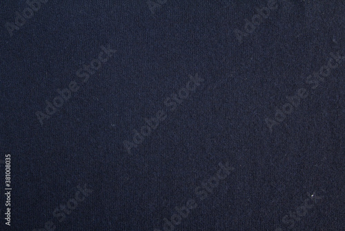Pattern with grey knitted wool fabric for clothing design. Colorful abstract seamless pattern. Gray background.
