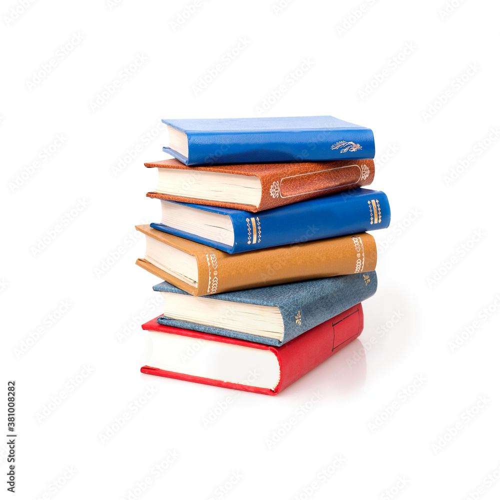 Stack of books in colour covers with white sheets isolated on a white background Stack of books in colour covers with white sheets isolated on a white background