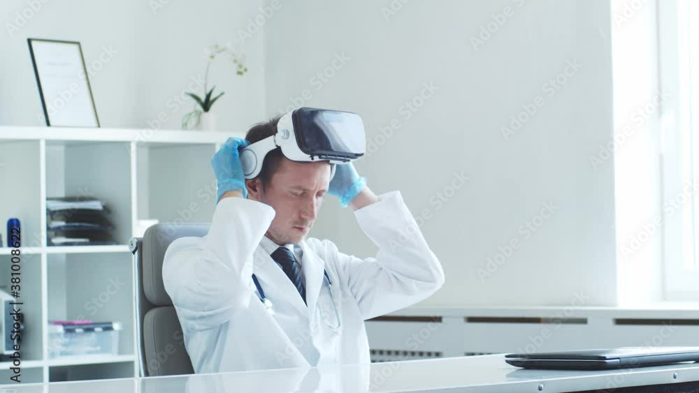 Professional medical doctor working in hospital office using virtual reality technology. Professional medical doctor working in hospital office using virtual reality technology.