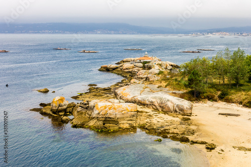 A Illa de Arousa, Spain. The lighthouse of Punta Cabalo in Galicia photo