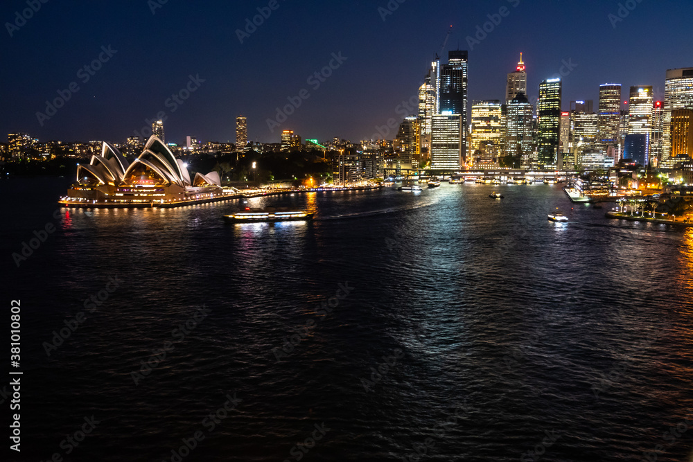 Sidney, Australia - 10 2018: Opera House and Circular quay at night