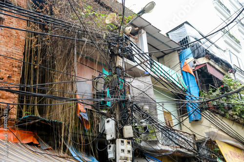Communication and electrical wires in the French Quarter of Hanoi Vietnam