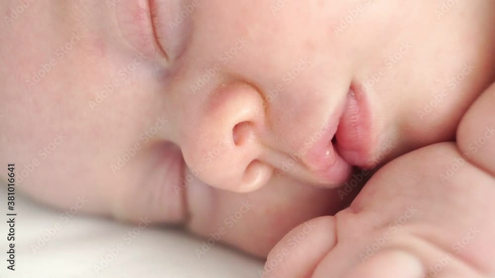 close up. face of sleeping baby. mode of day, healthy sleep in newborns. close up. face of sleeping baby. mode of day, healthy sleep in newborns.