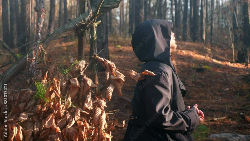 Solitary Recluse Hermit Monk Starts Day with Reading Bible. Camping site in Misty Wood. Autumn Morning. 2x Slow motion 60 FPS Solitary Recluse Hermit Monk Starts Day with Reading Bible. Camping site in Misty Wood. Autumn Morning. 2x Slow motion 60 FPS