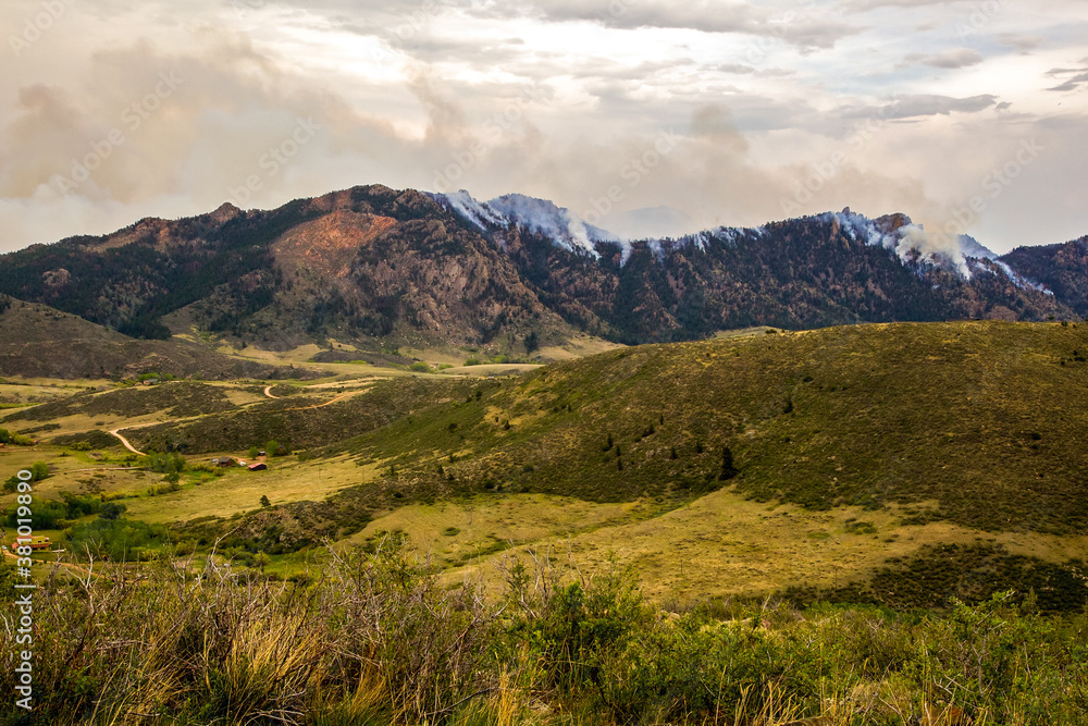 Fototapeta premium Wildfire Smoke Billowing on a Mountainside 