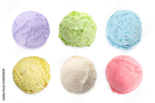 Set with scoops of different ice creams on white background
