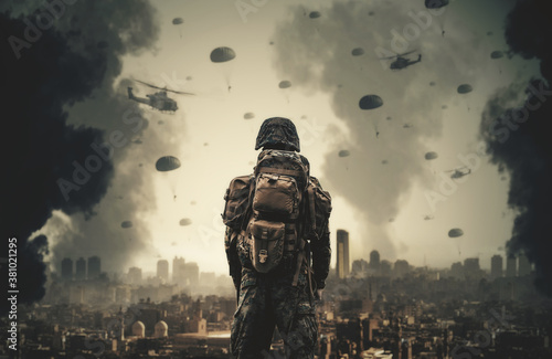 Fotografie A soldier watching forces and helicopters in the sky top of destroyed city