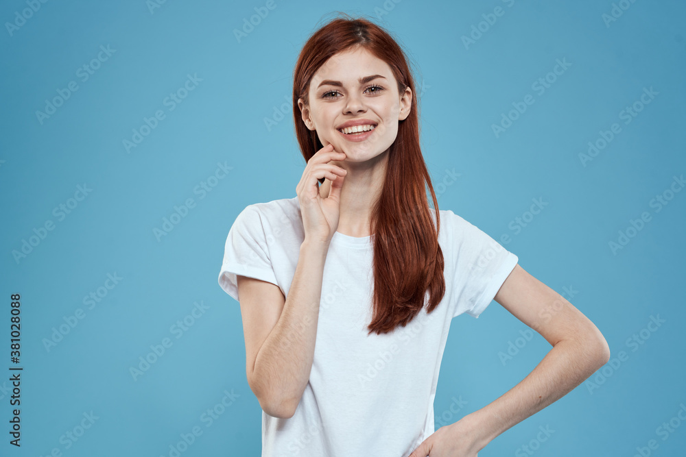 pretty woman white tshirt long hair glamor lifestyle cropped view blue background pretty woman white tshirt long hair glamor lifestyle cropped view blue background