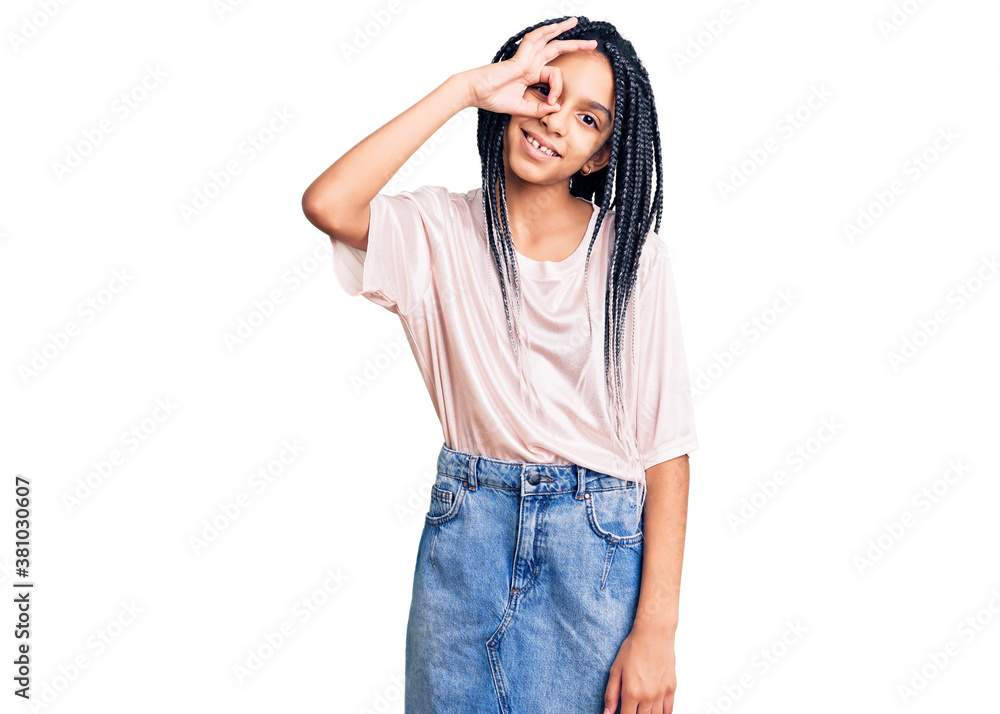 Cute african american girl wearing casual clothes smiling happy doing ok sign with hand on eye looking through fingers Cute african american girl wearing casual clothes smiling happy doing ok sign with hand on eye looking through fingers