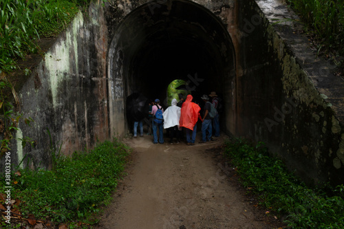 Amaga  Antioquia   Colombia. March 31  2019. People emerging from a dark tunnel into the light