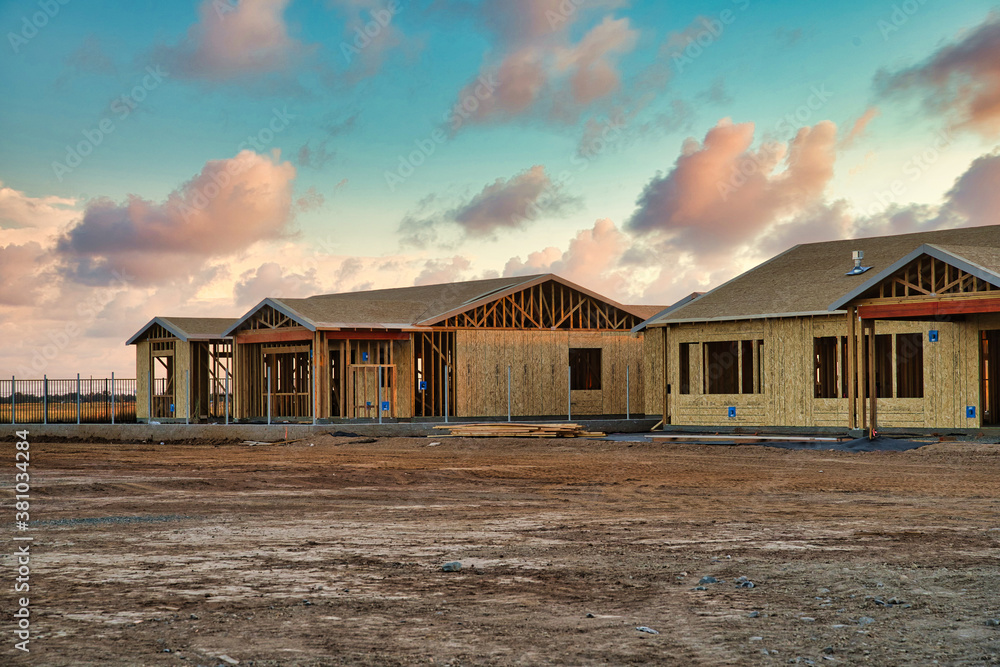 Φωτογραφία New construction of framing and roofing of residential homes in California with