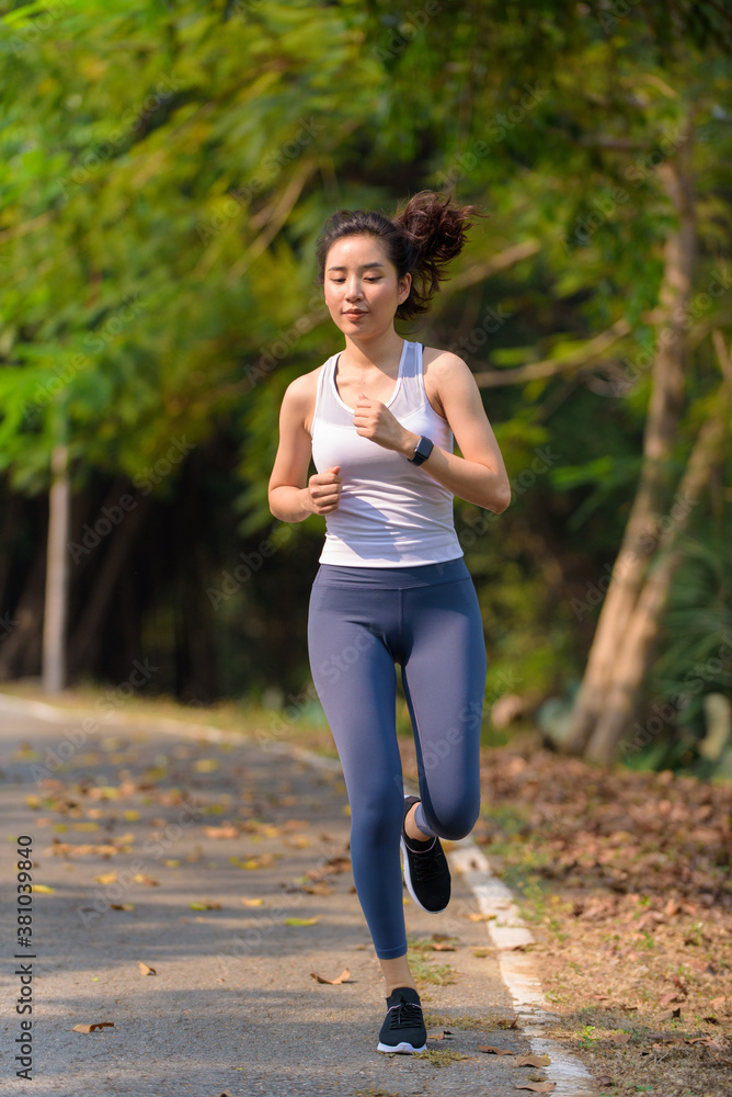 Young woman running in a park